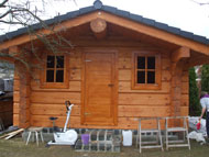 The log cabin is already fitted with doors and windows