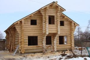 Log cabin house under construction